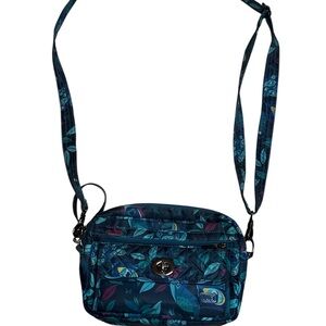 Lug switch convertible crossbody/belt bag in peacock